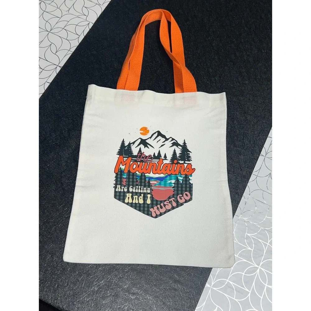 The‎ Mountains Are Calling Graphic Canvas Tote Bag White Orange Trim